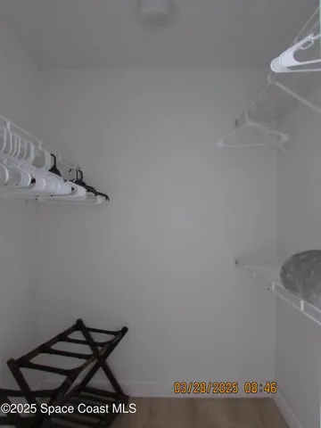a picture of a room with racks on the wall