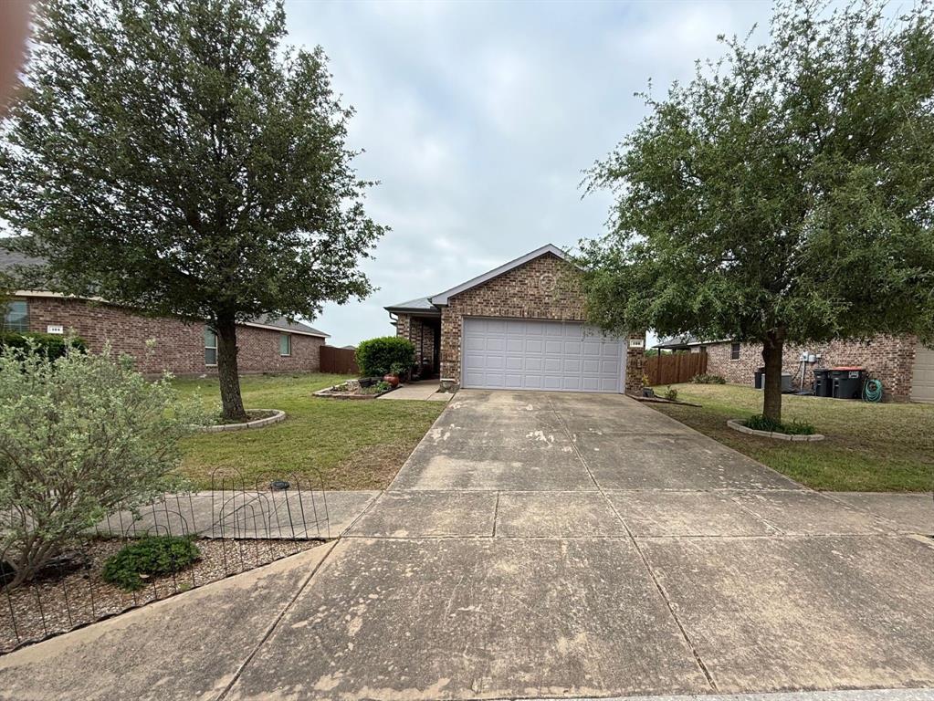 120 Chalk Road Anna, TX 75409 - Photo 2 of 29 a front view of a house with a yard and a large tree