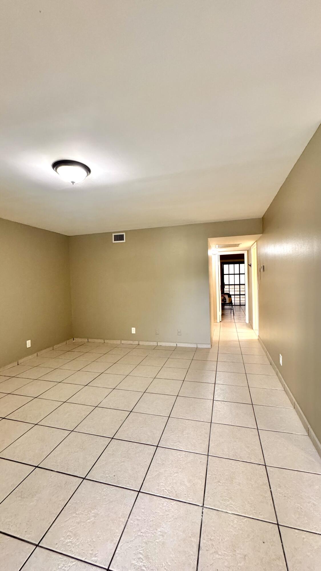 2100 Springdale Boulevard, Unit 202 Palm Springs, FL 33461 - Photo 5 of 18 Living Room