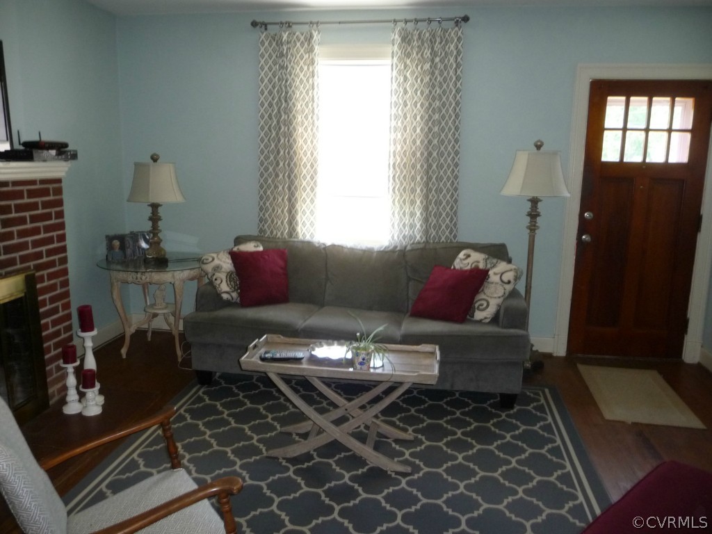 4200 Courthouse Road Midlothian, VA 23112 - Photo 8 of 16 a living room with furniture and wooden floor