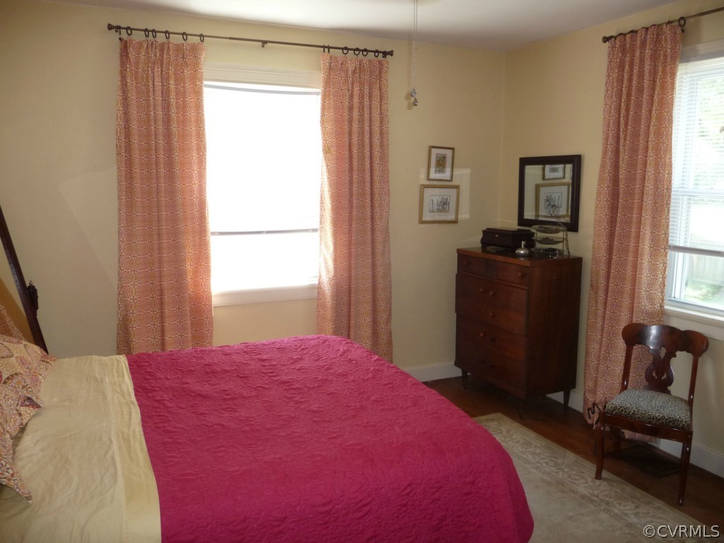 4200 Courthouse Road Midlothian, VA 23112 - Photo 10 of 16 a bedroom with a bed and wooden floor