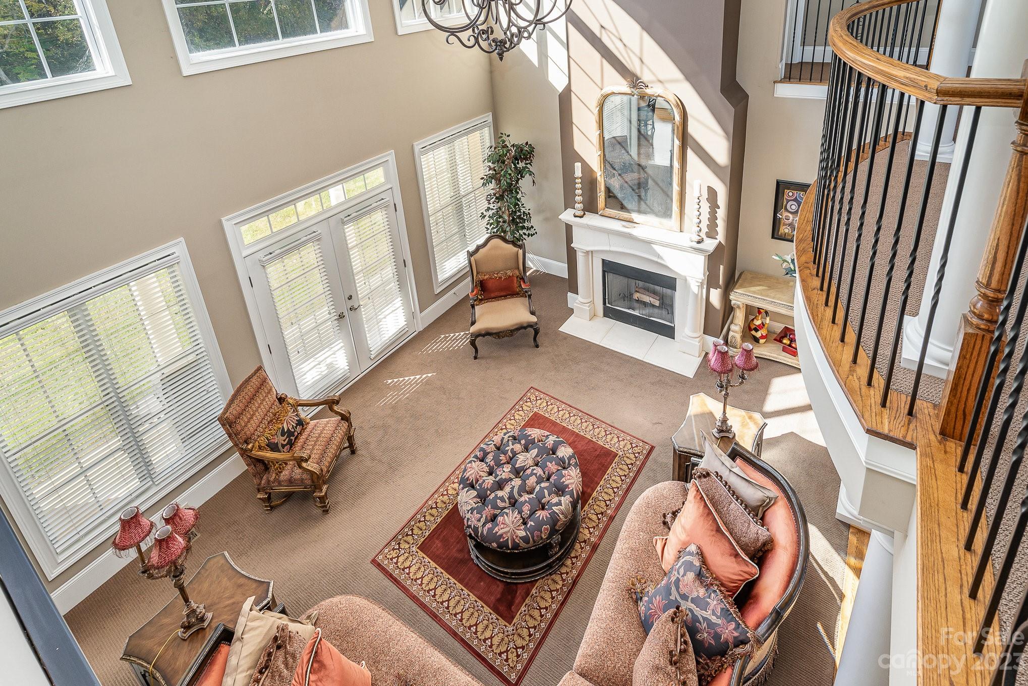6224 Medlin Road Monroe, NC 28112 - Photo 5 of 21 a living room with furniture and a fireplace