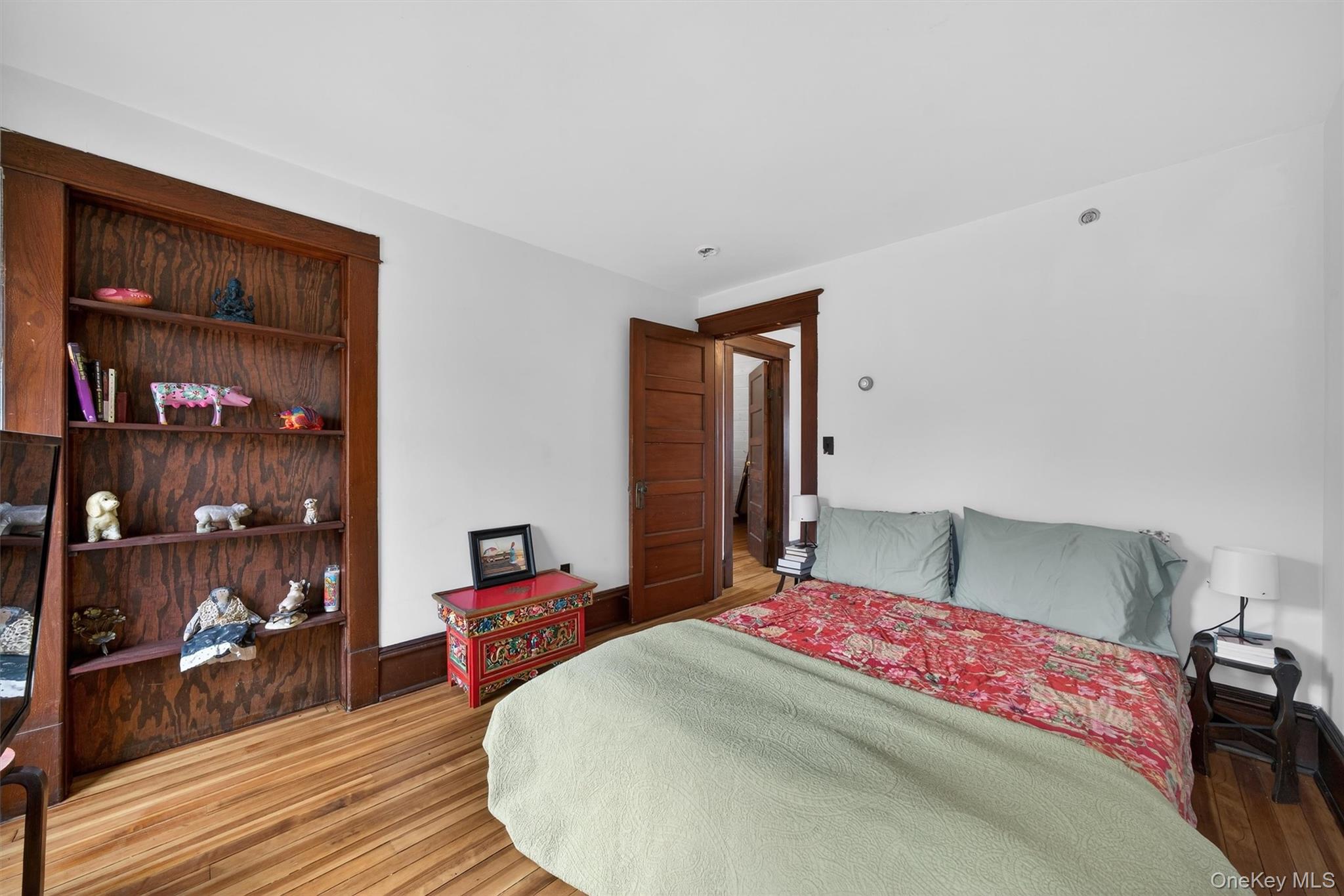 48 Kirks Road Narrowsburg, NY 12764 - Photo 27 of 50 a bedroom with a bed and a wooden floor
