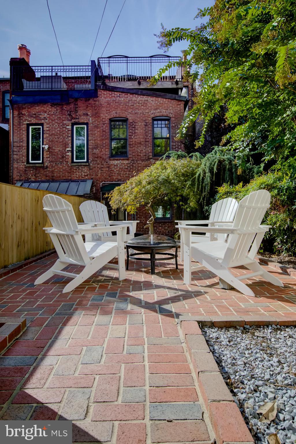 632 C Street Northeast Washington, DC 20002 - Photo 12 of 34 a view of a chairs and tables in the back yard of the house