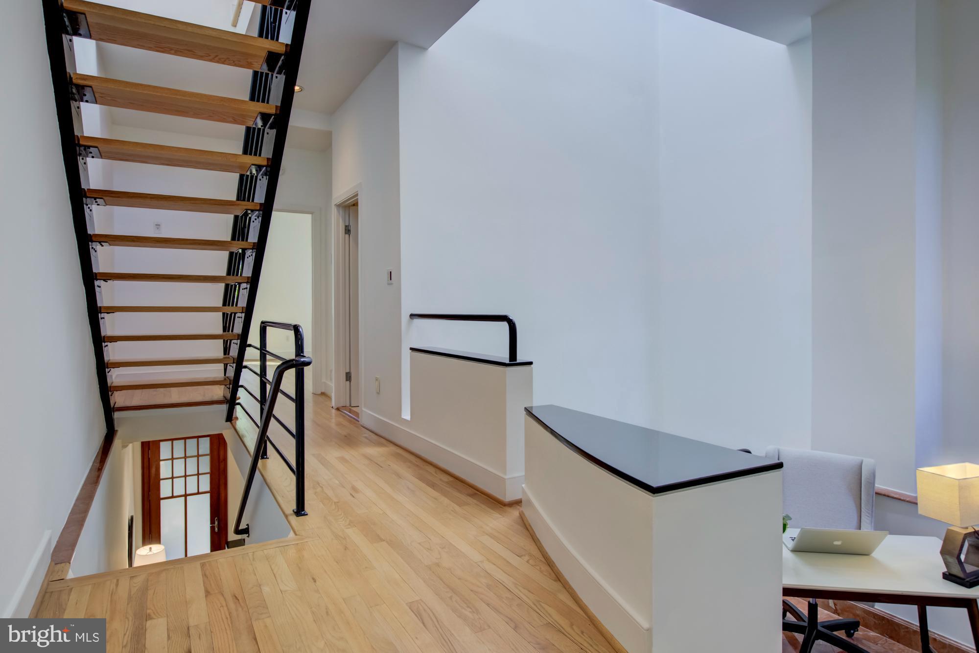 632 C Street Northeast Washington, DC 20002 - Photo 13 of 34 a view of entryway with stairs and wooden floor