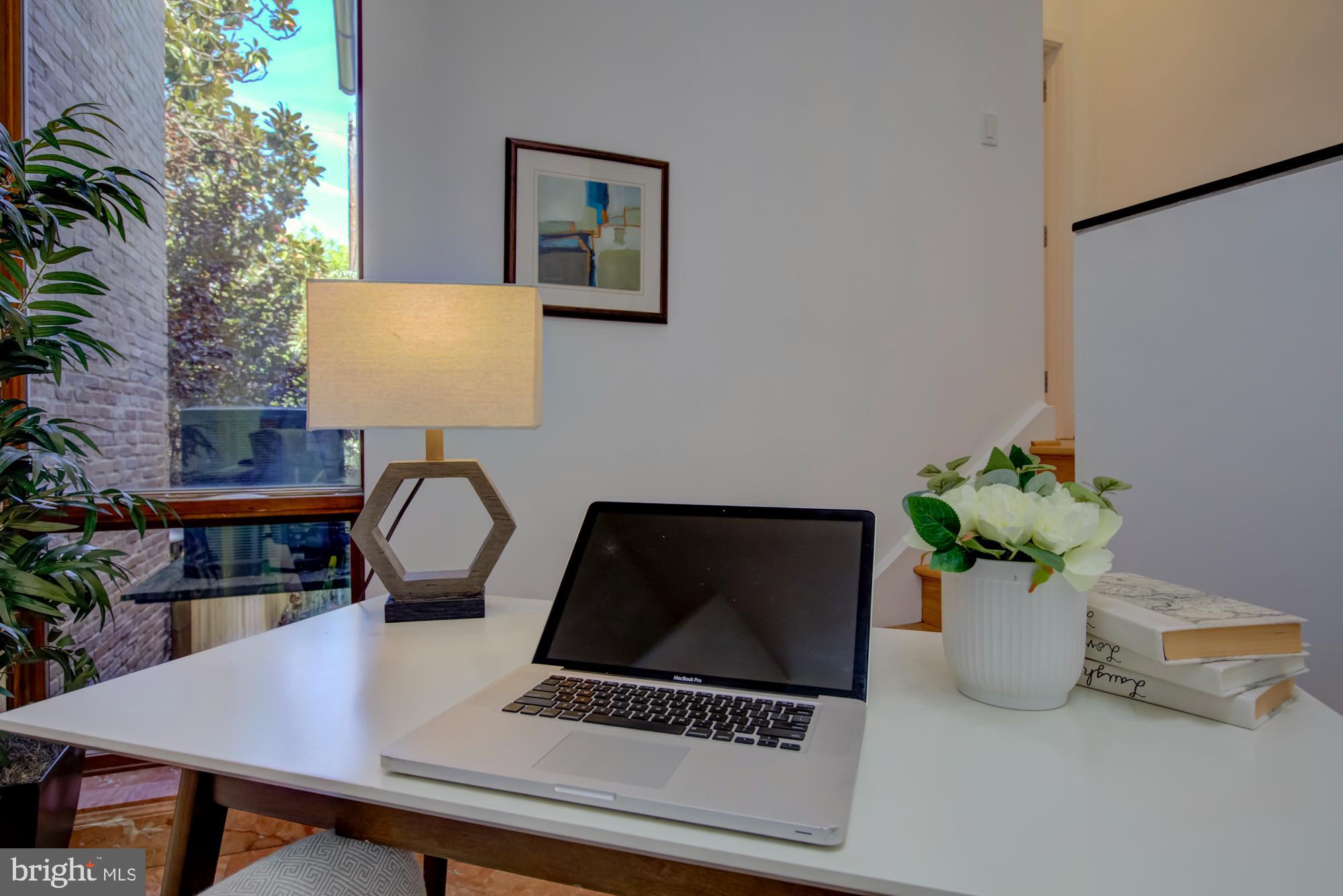632 C Street Northeast Washington, DC 20002 - Photo 14 of 34 a living room with furniture and a potted plant