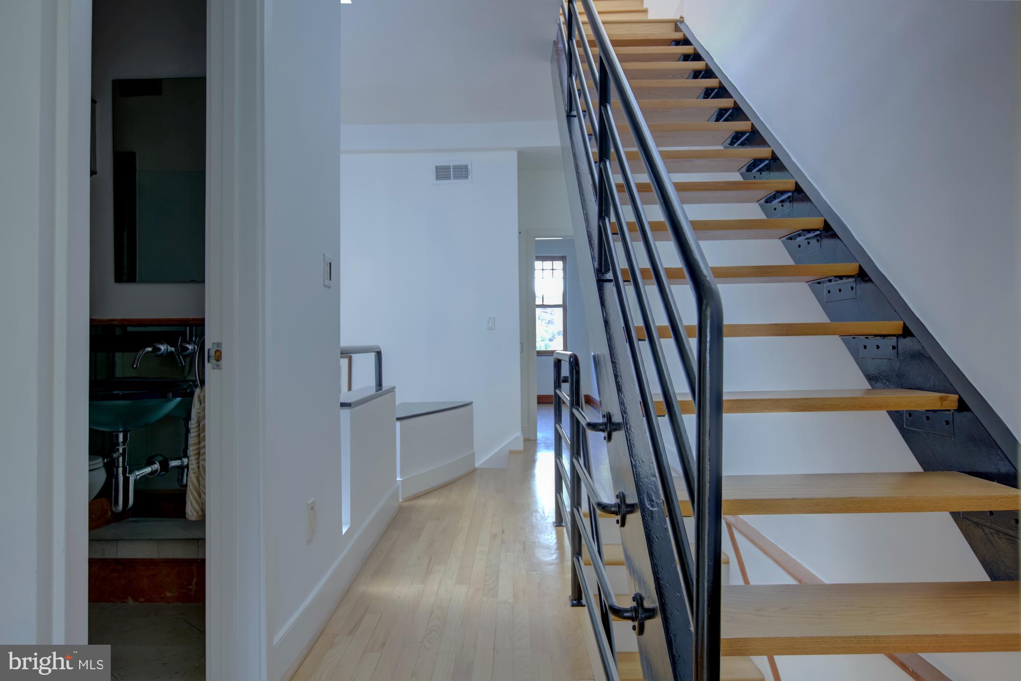 632 C Street Northeast Washington, DC 20002 - Photo 20 of 34 a view of stairs and wooden floor