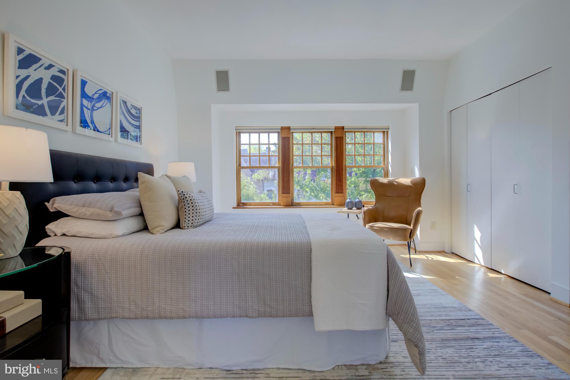 632 C Street Northeast Washington, DC 20002 - Photo 23 of 34 a bedroom with a bed and wooden floor