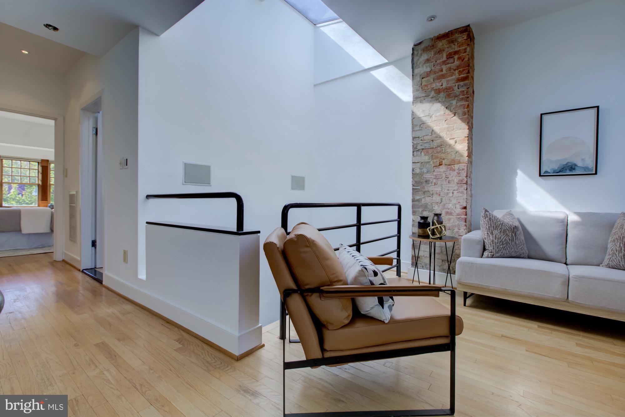 632 C Street Northeast Washington, DC 20002 - Photo 27 of 34 a living room with furniture and wooden floor
