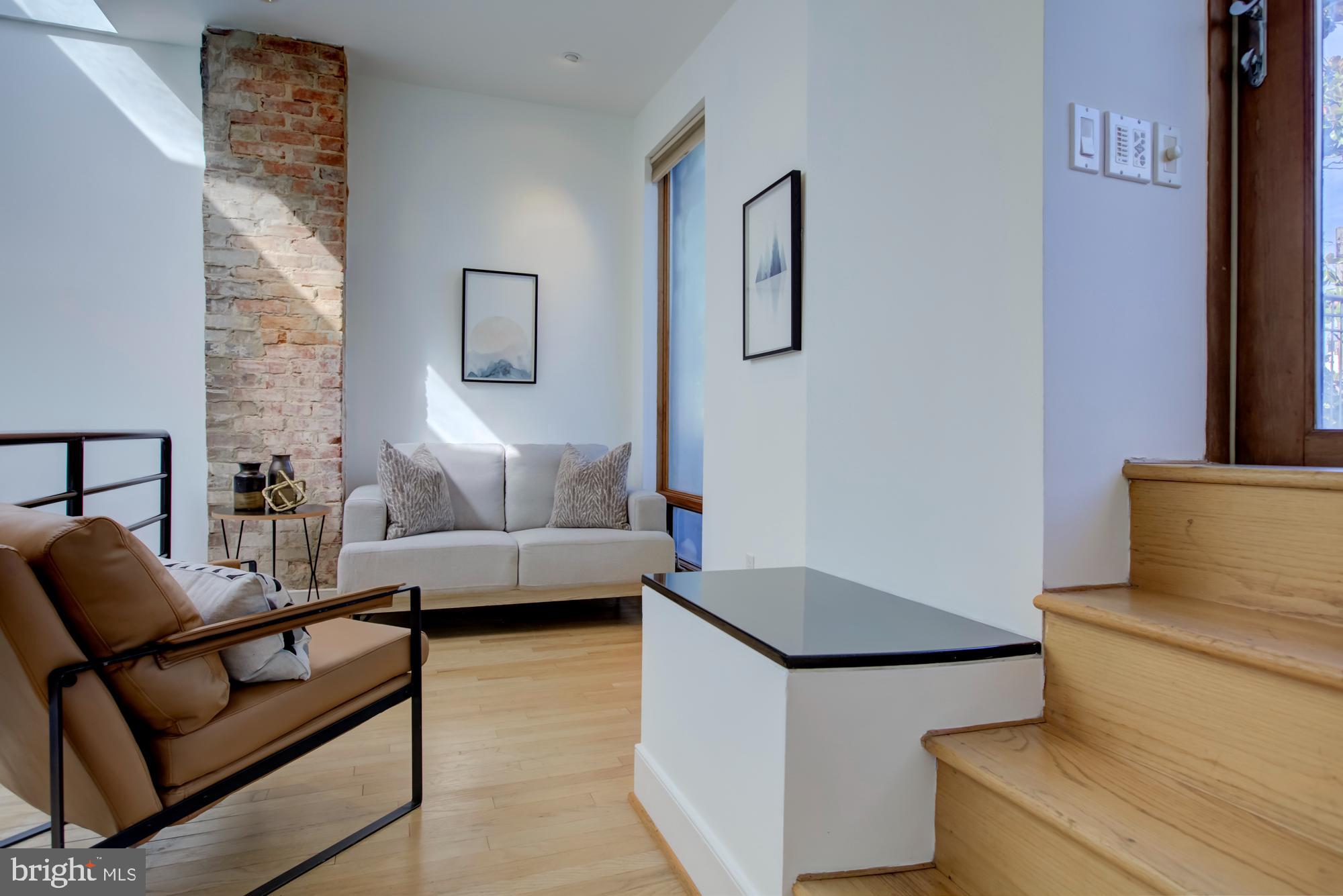632 C Street Northeast Washington, DC 20002 - Photo 28 of 34 a living room with furniture and a couch