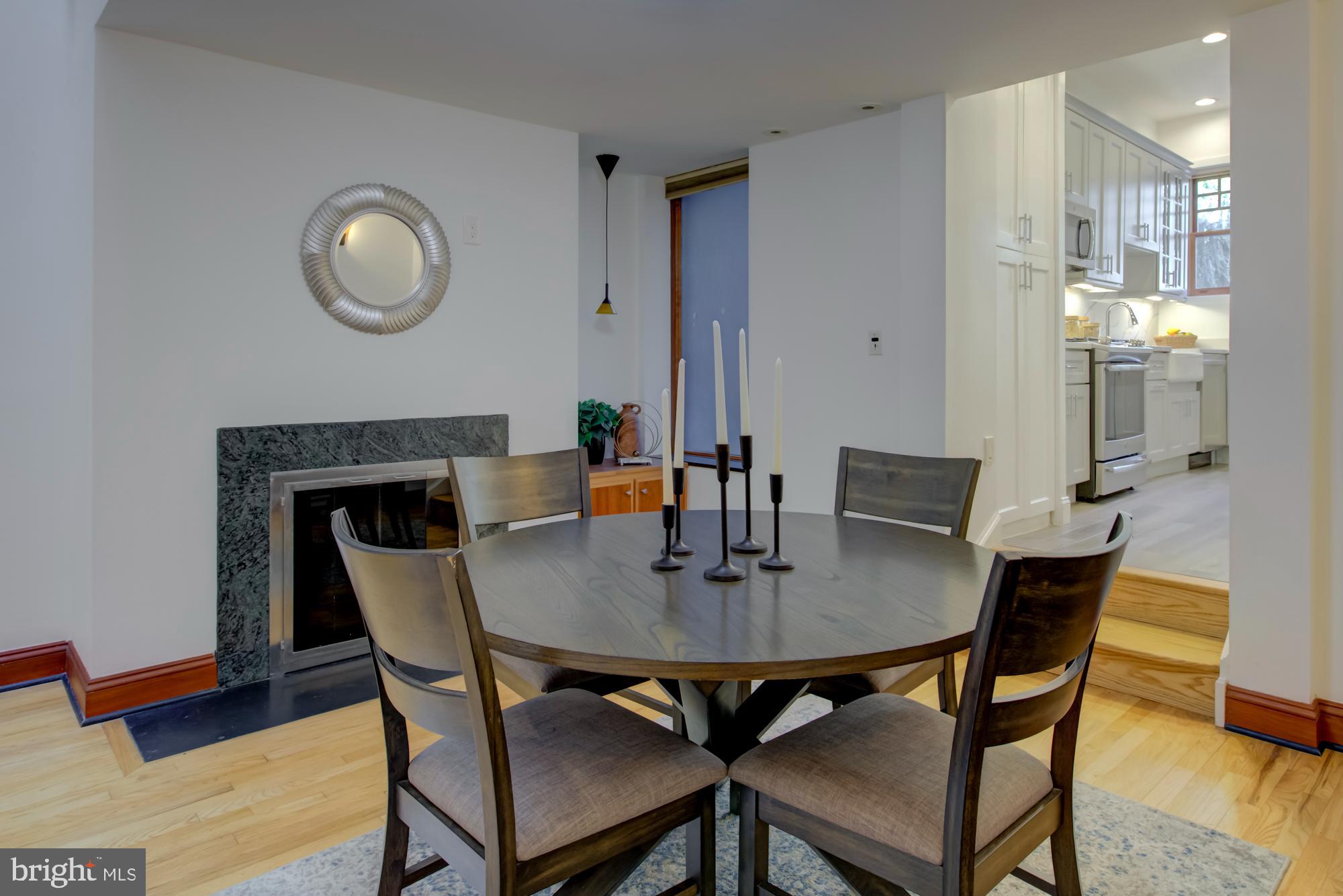 632 C Street Northeast Washington, DC 20002 - Photo 7 of 34 a view of a dining room with furniture and wooden floor