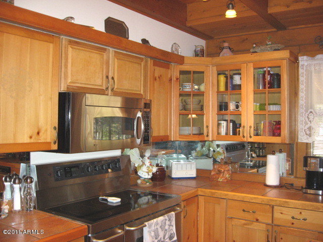 264 Mail Trail Road Young, AZ 85554 - Photo 36 of 54 cabinets above range