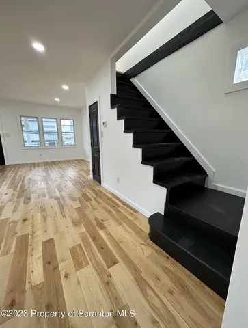 a view of entryway with stairs