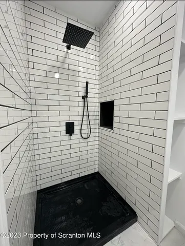 a bathroom with a shower