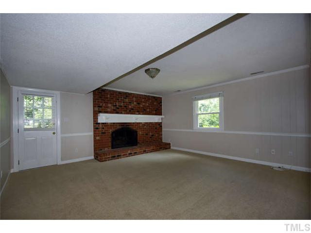 7009 Tanbark Way Raleigh, NC 27615 - Photo 9 of 25 Den/Family/Great Room