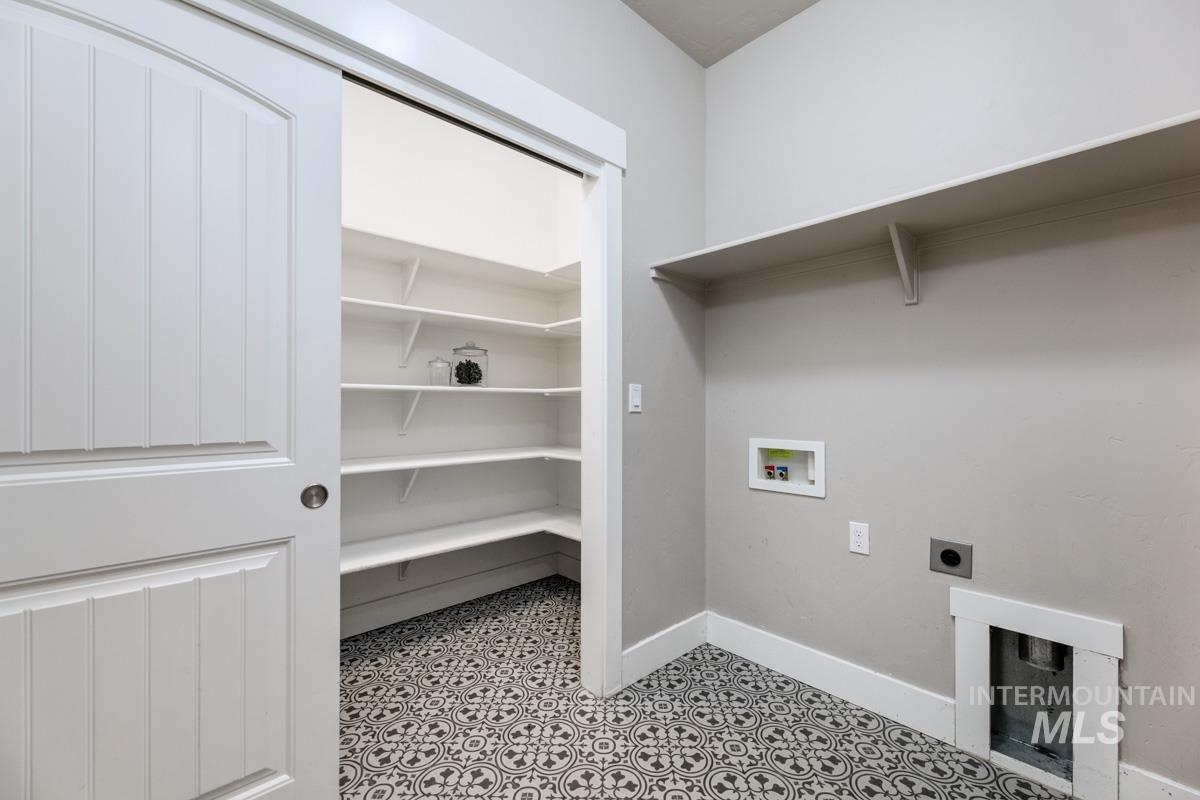 3902 North Rotaldo Avenue Meridian, ID 83646 - Photo 19 of 34 Washroom with electric dryer hookup and washer hookup