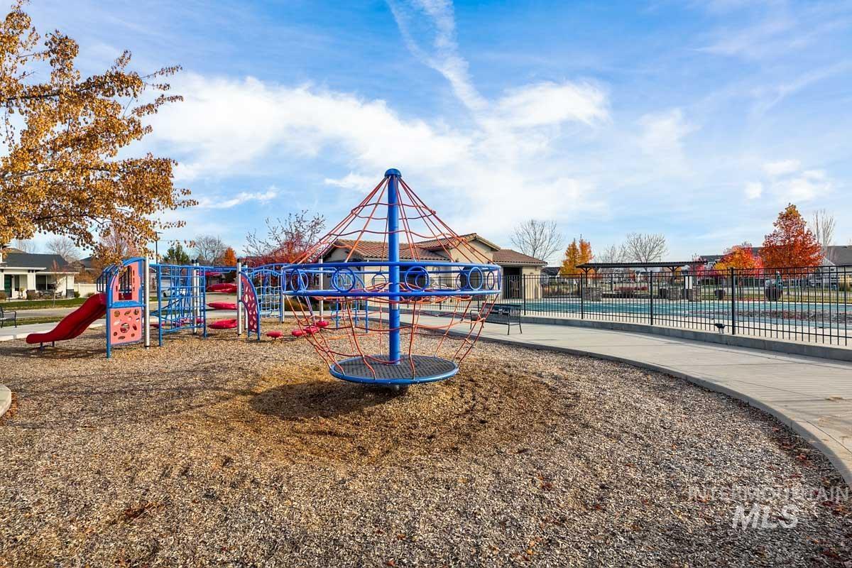 3902 North Rotaldo Avenue Meridian, ID 83646 - Photo 31 of 34 Communal playground with a community pool