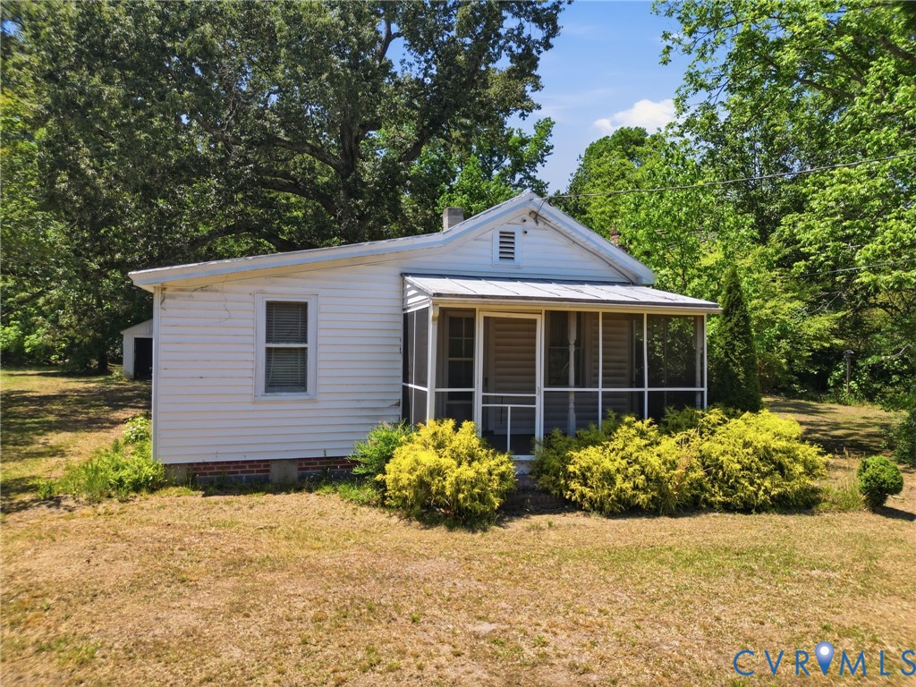 2350 Chelsea Road West Point, VA 23181 - Photo 5 of 34 a front view of a house with garden