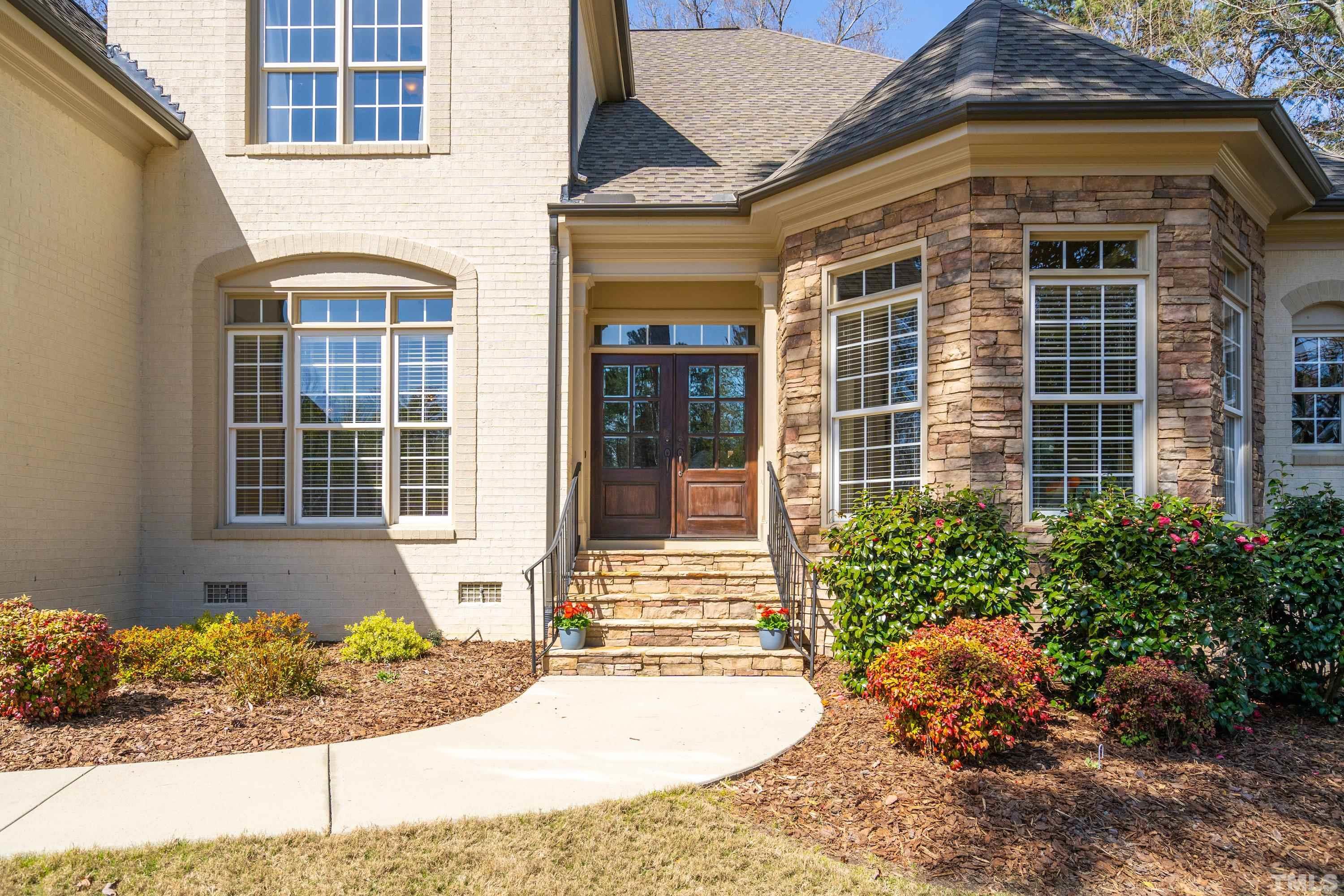 4328 Summer Brook Drive Apex, NC 27539 - Photo 4 of 76 a front view of a house