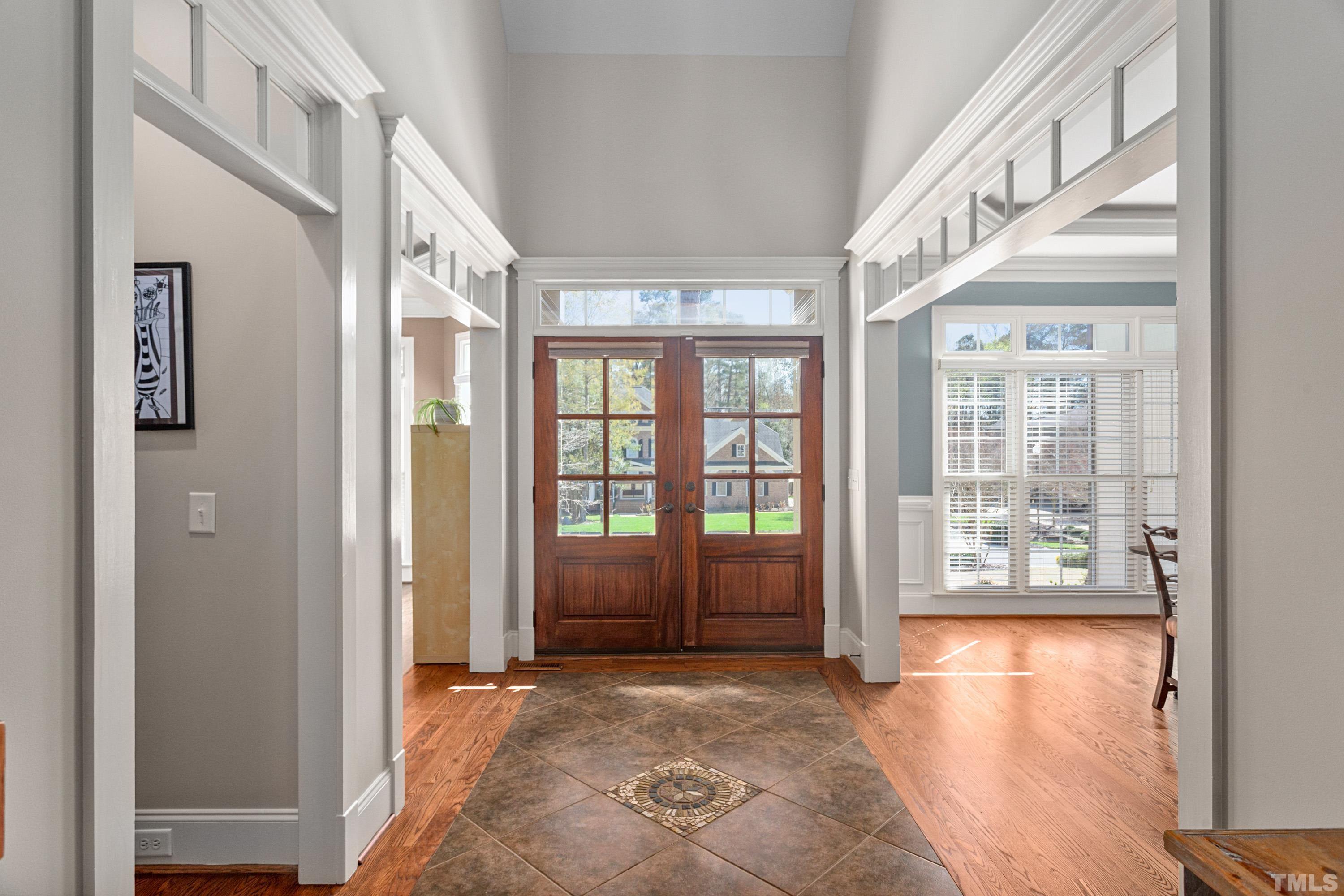 4328 Summer Brook Drive Apex, NC 27539 - Photo 5 of 76 a view of an entryway with a floor to ceiling window