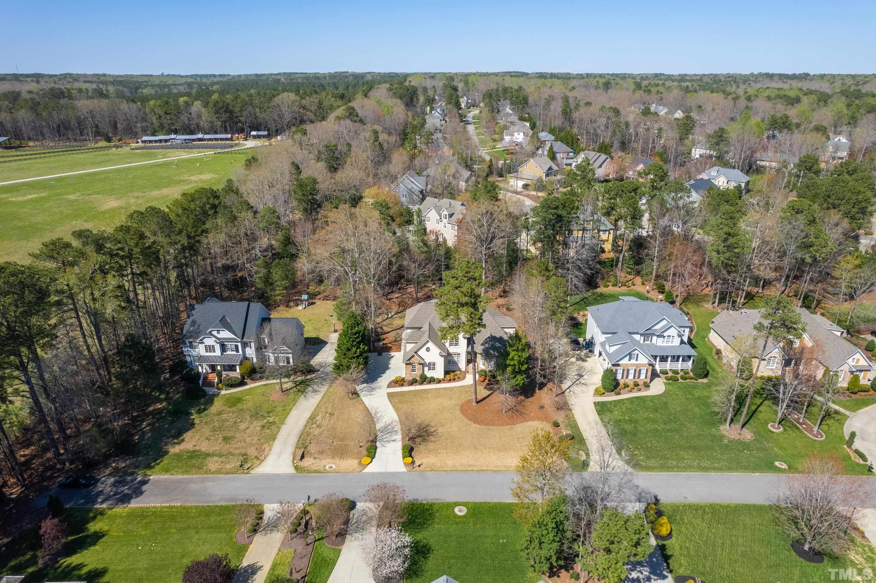 4328 Summer Brook Drive Apex, NC 27539 - Photo 65 of 76 an aerial view of residential houses with outdoor space and swimming pool