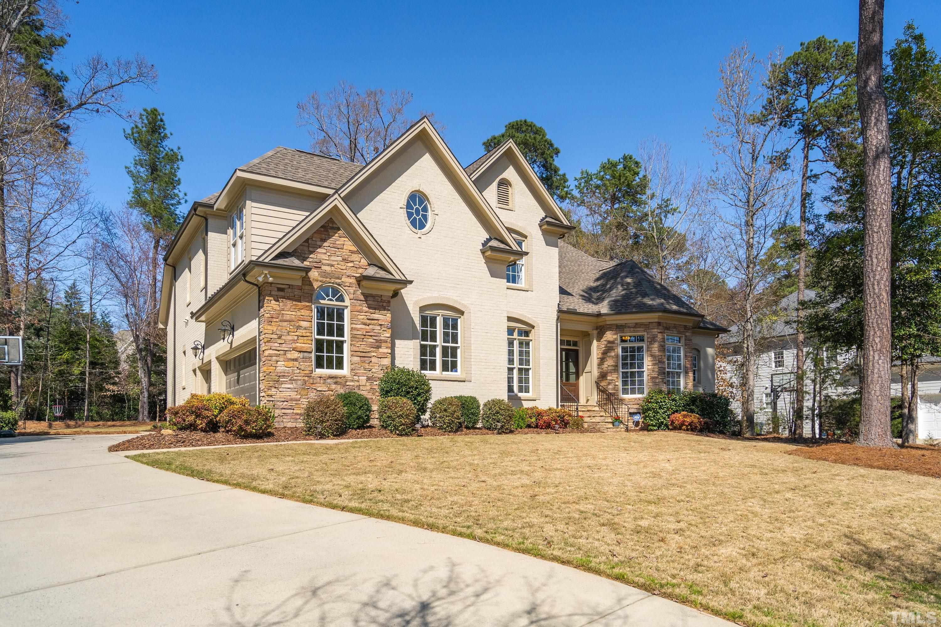 4328 Summer Brook Drive Apex, NC 27539 - Photo 73 of 76 a front view of a house with a yard