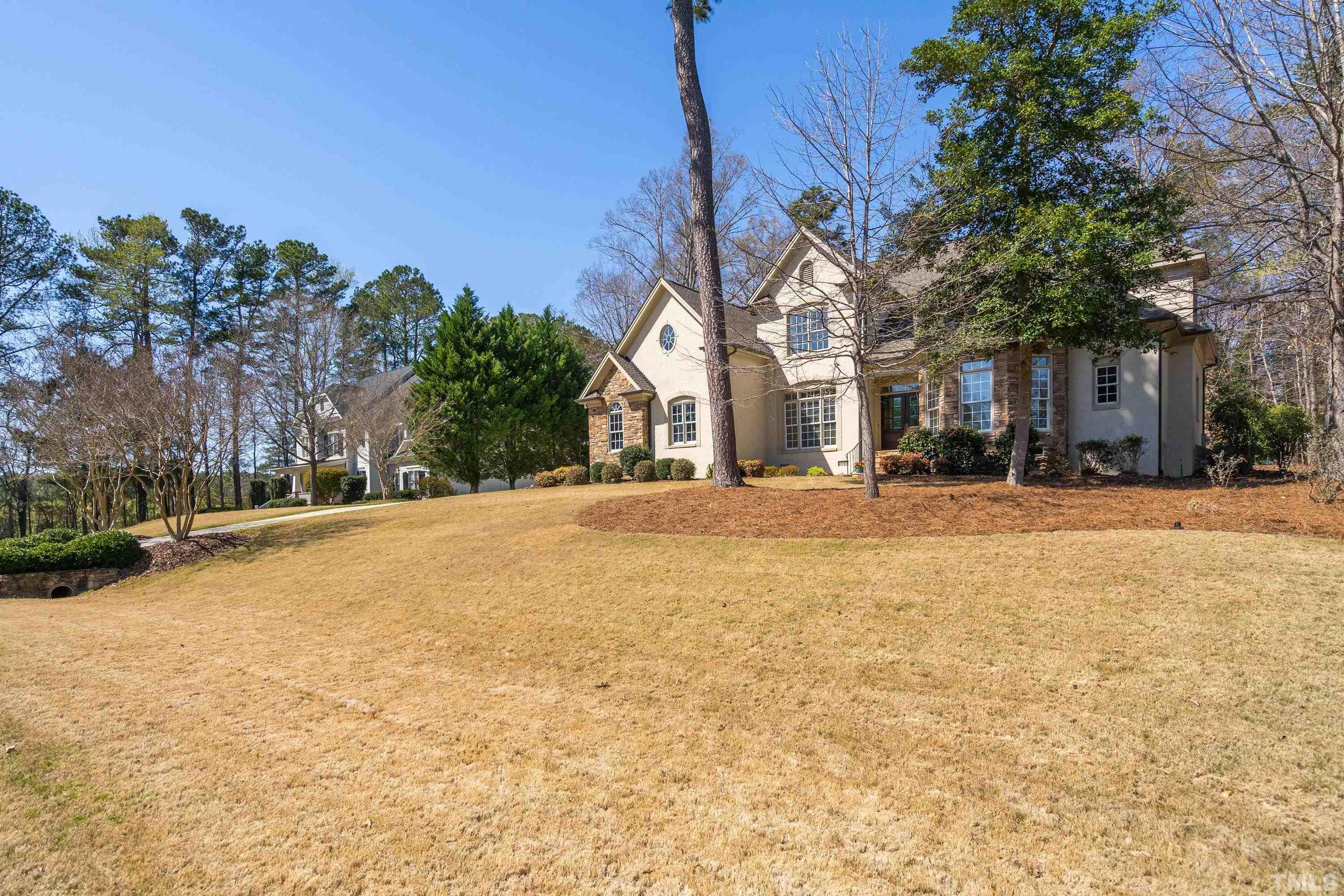 4328 Summer Brook Drive Apex, NC 27539 - Photo 76 of 76 a view of road with large trees