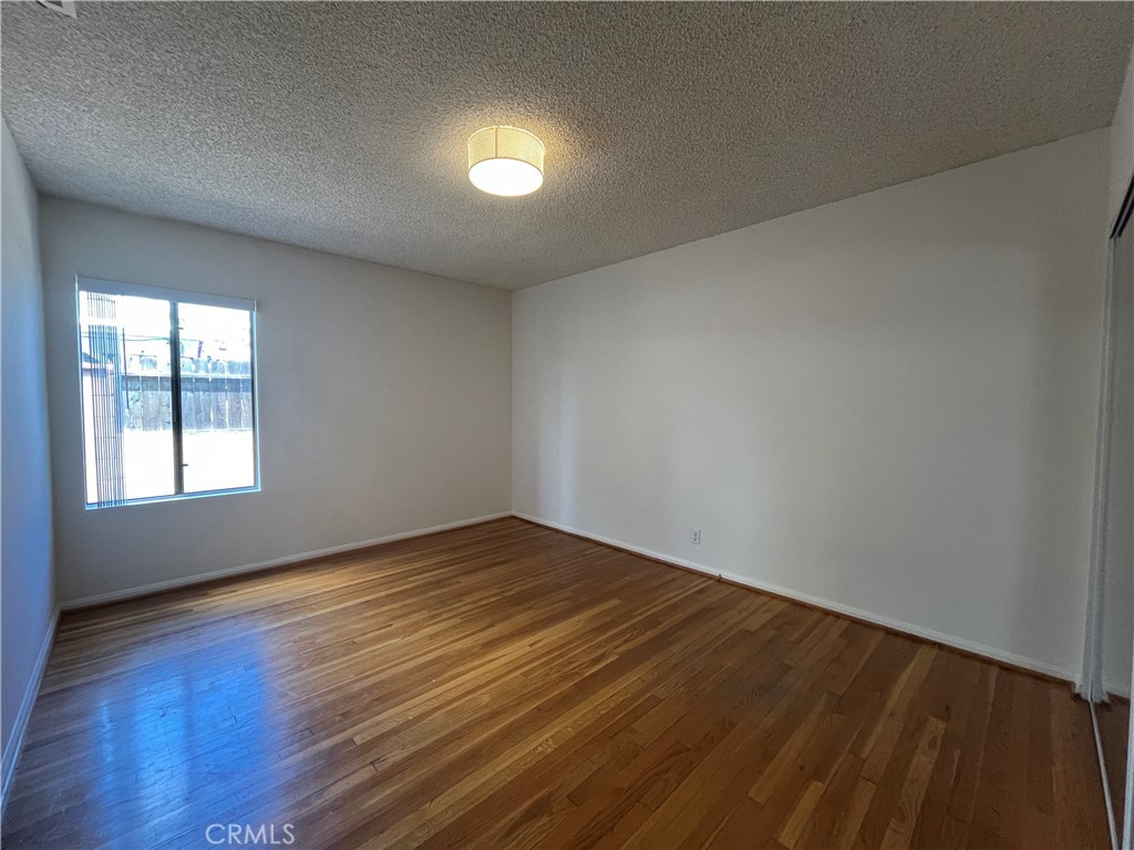 18029 Santa Rita Street Encino, CA 91316 - Photo 9 of 20 a view of an empty room and window