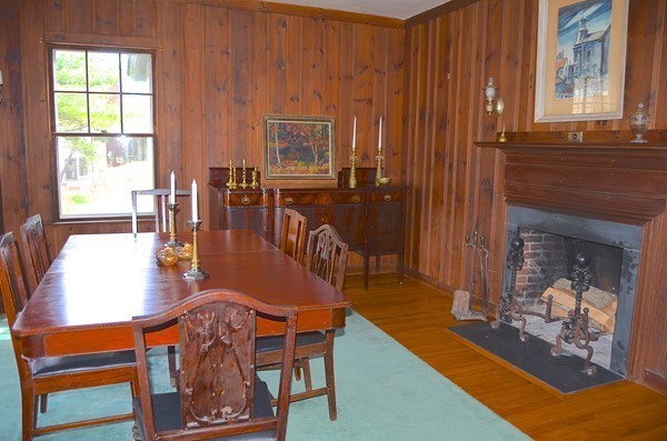 6 Davis Road Marblehead, MA 01945 - Photo 11 of 22 a dining room with furniture window and wooden floor