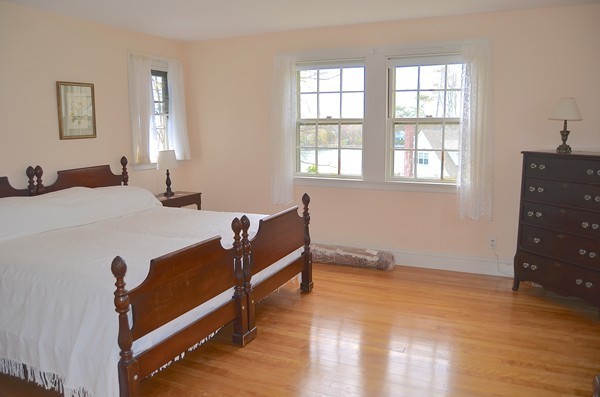 6 Davis Road Marblehead, MA 01945 - Photo 18 of 22 a bedroom with furniture and window