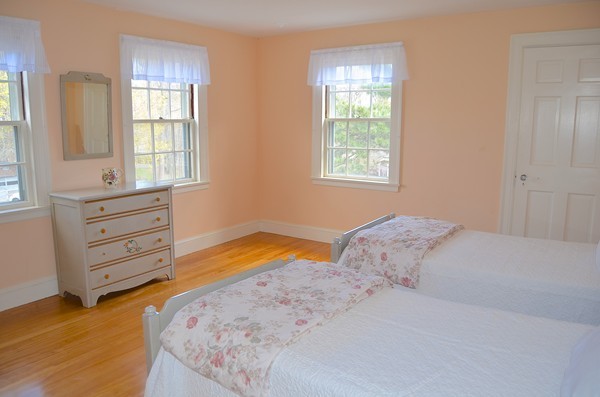 6 Davis Road Marblehead, MA 01945 - Photo 21 of 22 a bedroom with a bed and a window