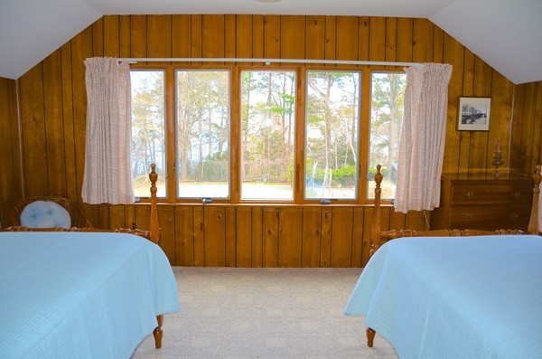 6 Davis Road Marblehead, MA 01945 - Photo 22 of 22 a bedroom with a bed and a window
