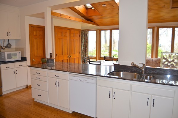 6 Davis Road Marblehead, MA 01945 - Photo 8 of 22 a kitchen with sink and cabinets