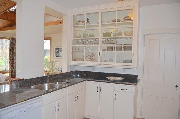 6 Davis Road Marblehead, MA 01945 - Photo 10 of 22 a kitchen with granite countertop a sink and cabinets