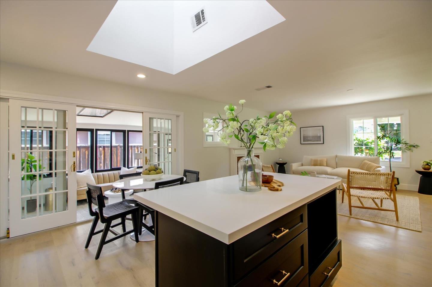 2229 Tulip Road San Jose, CA 95128 - Photo 12 of 34 a kitchen that has a table and chairs in it