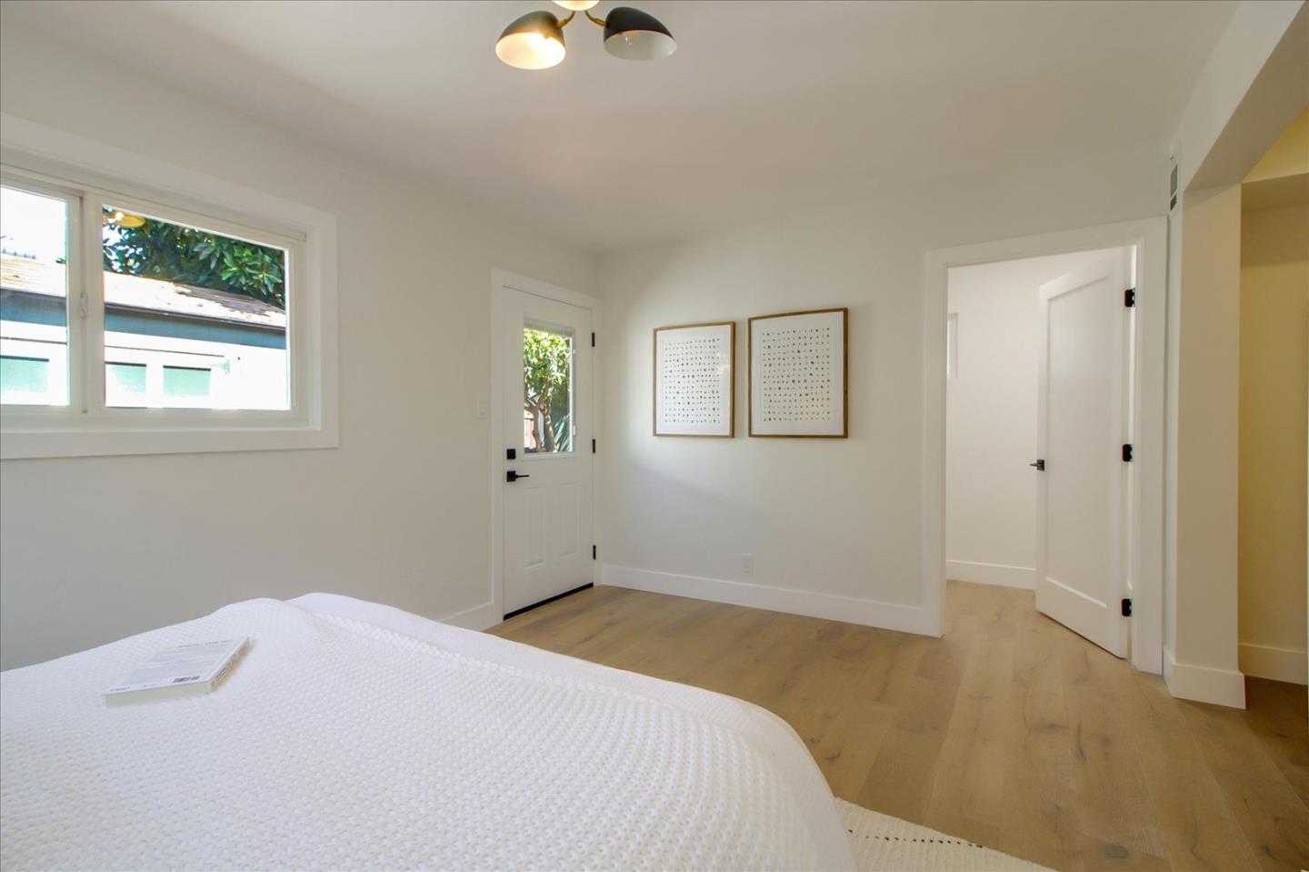 2229 Tulip Road San Jose, CA 95128 - Photo 21 of 34 a bedroom with a bed and a window
