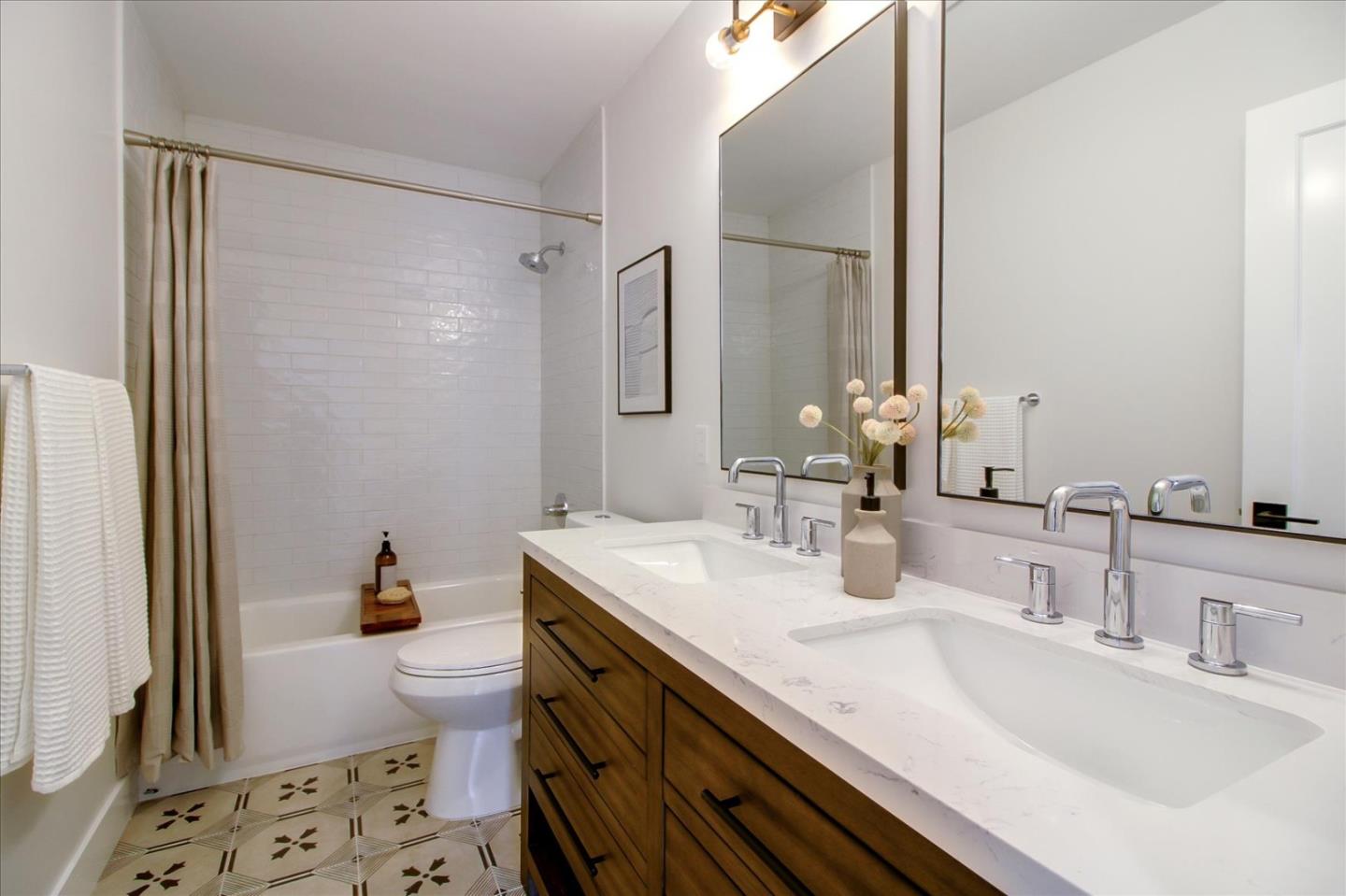 2229 Tulip Road San Jose, CA 95128 - Photo 26 of 34 a bathroom with a sink and a mirror