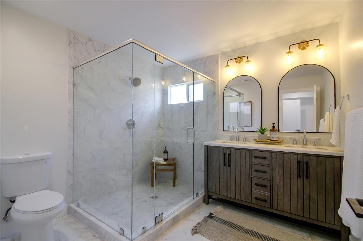 2229 Tulip Road San Jose, CA 95128 - Photo 27 of 34 a spacious bathroom with a granite countertop sink mirror and toilet