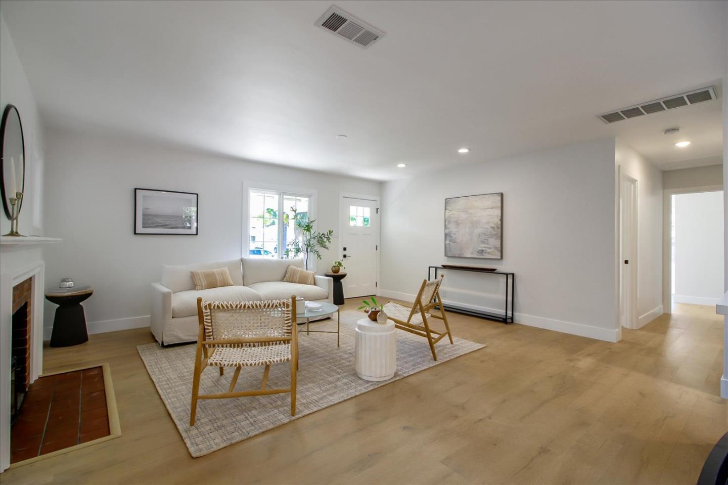 2229 Tulip Road San Jose, CA 95128 - Photo 5 of 34 a living room with furniture and a table