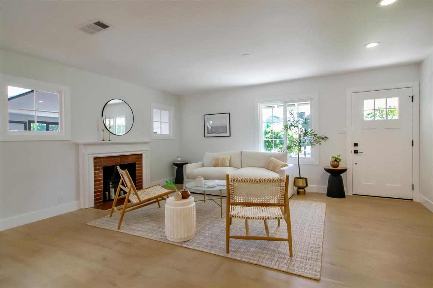 2229 Tulip Road San Jose, CA 95128 - Photo 6 of 34 a living room with furniture and a fireplace