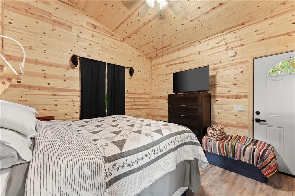 101 Rocket Drive Cleveland, GA 30528 - Photo 11 of 20 a bedroom with a bed and a flat screen tv