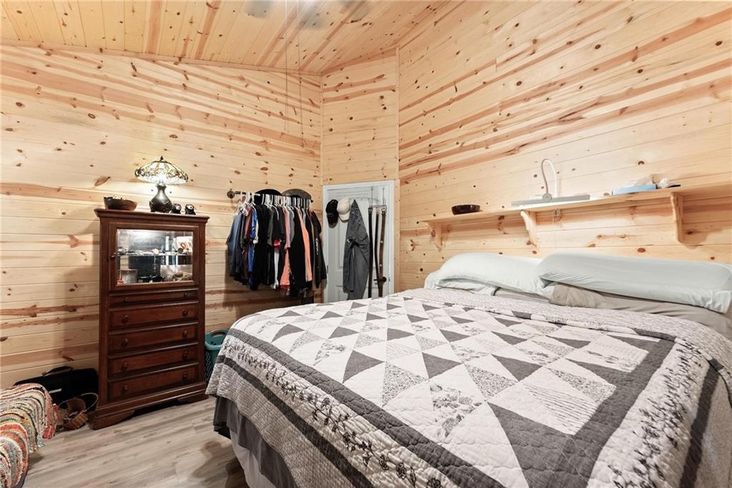 101 Rocket Drive Cleveland, GA 30528 - Photo 12 of 20 a bed room with a bed and a walk in closet