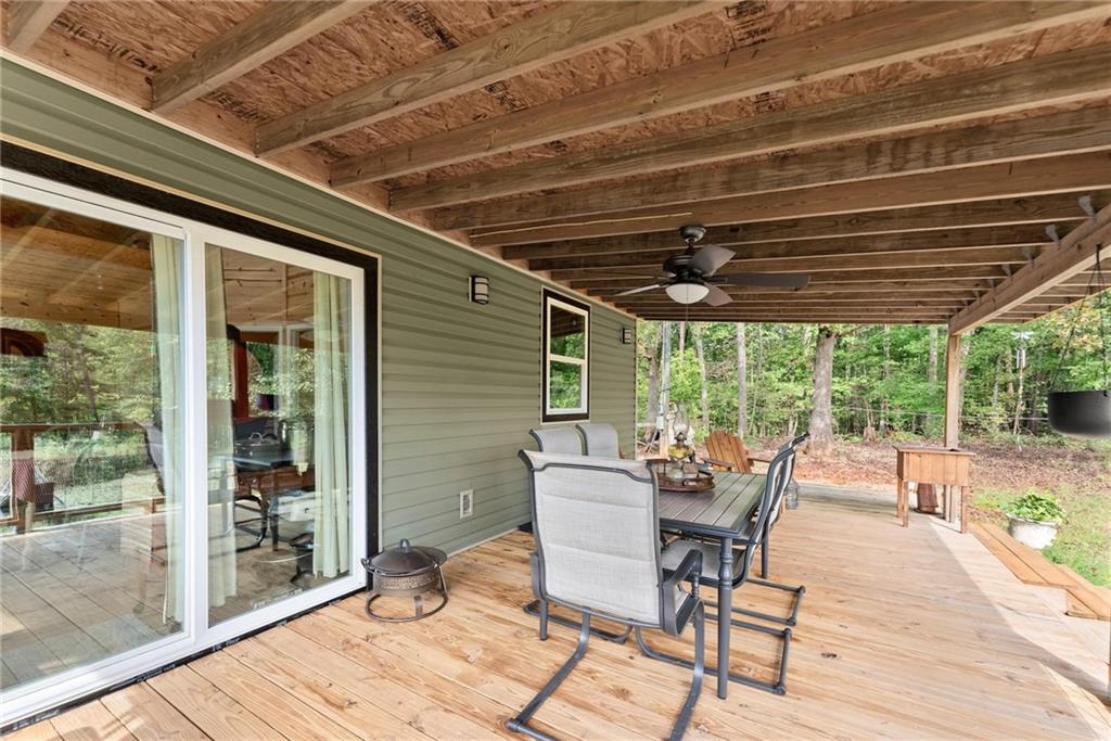 101 Rocket Drive Cleveland, GA 30528 - Photo 15 of 20 a dining room with furniture and wooden floor