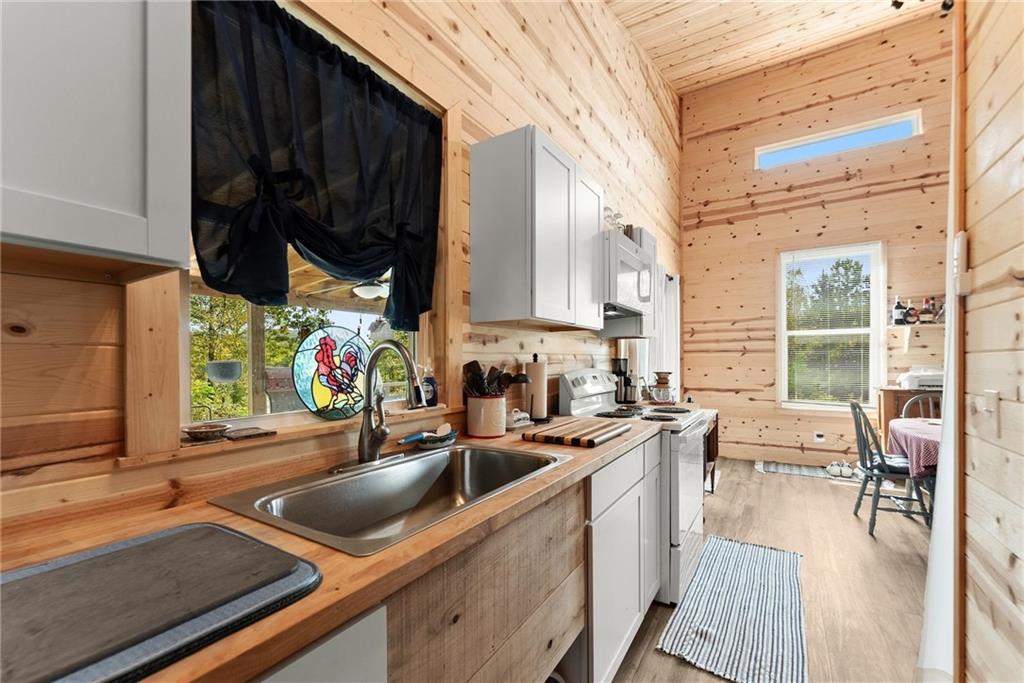 101 Rocket Drive Cleveland, GA 30528 - Photo 10 of 20 a kitchen that has a sink and a stove