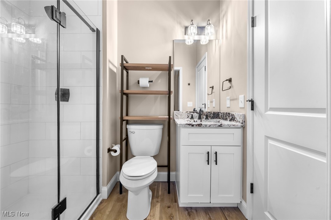 39600 Aurora Road Solon, OH 44139 - Photo 20 of 49 1Floor Full bath featuring a stall shower, vanity