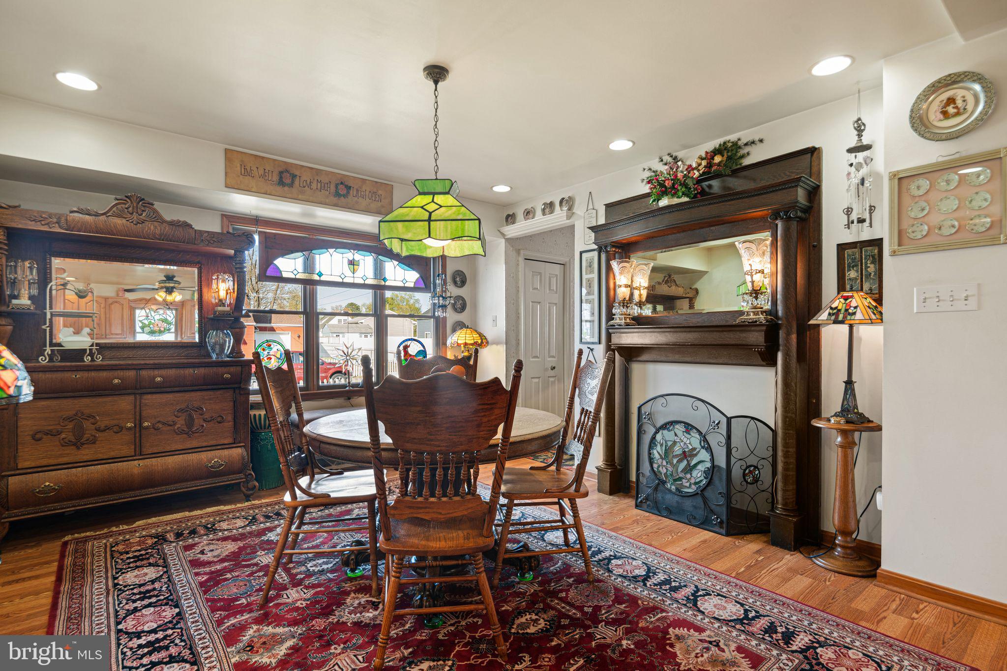 91 Estates Road Pine Hill, NJ 08021 - Photo 18 of 34 a view of a dining room with furniture window and wooden floor