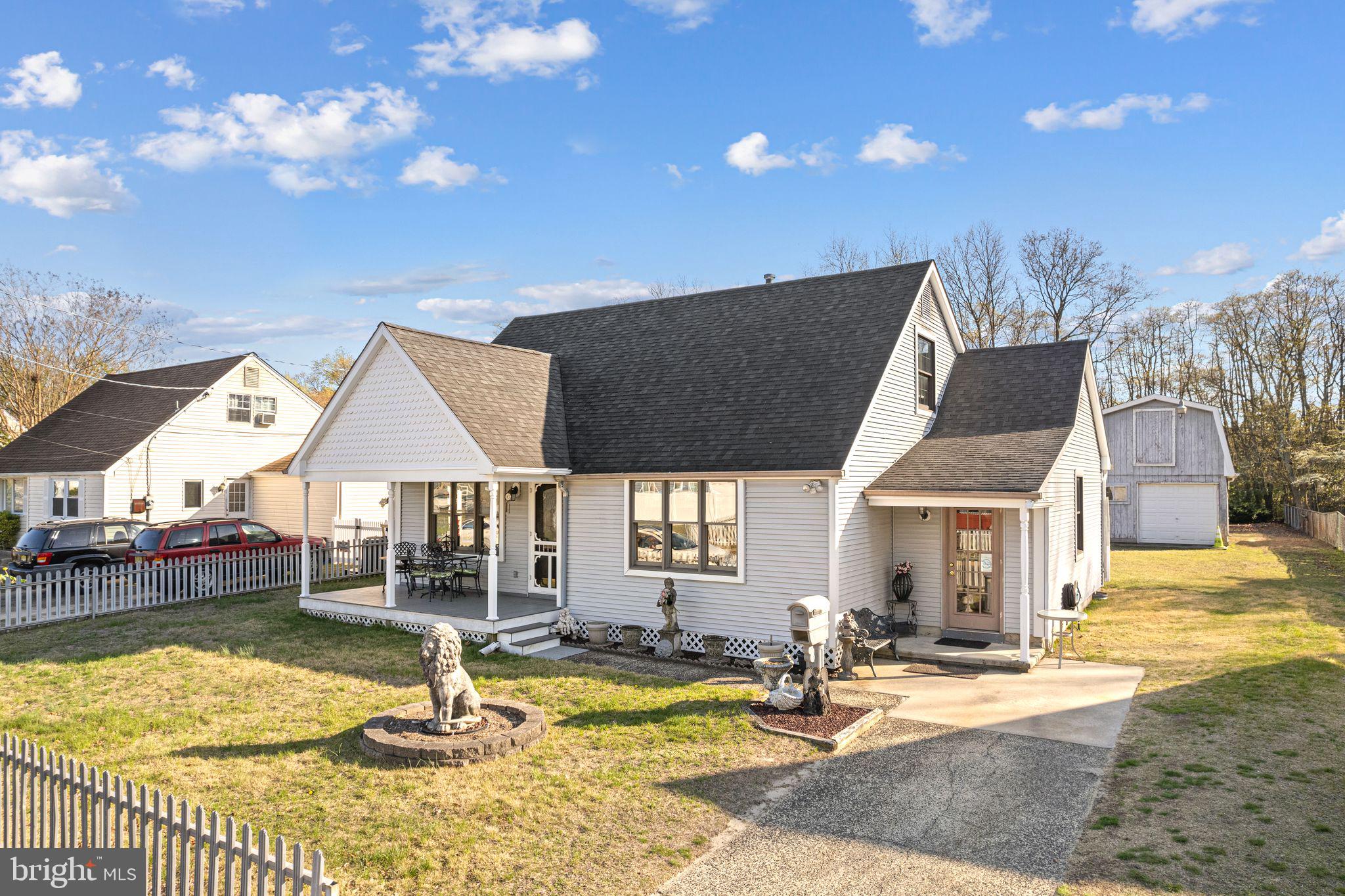 91 Estates Road Pine Hill, NJ 08021 - Photo 2 of 34 a view of a house with swimming pool and sitting area