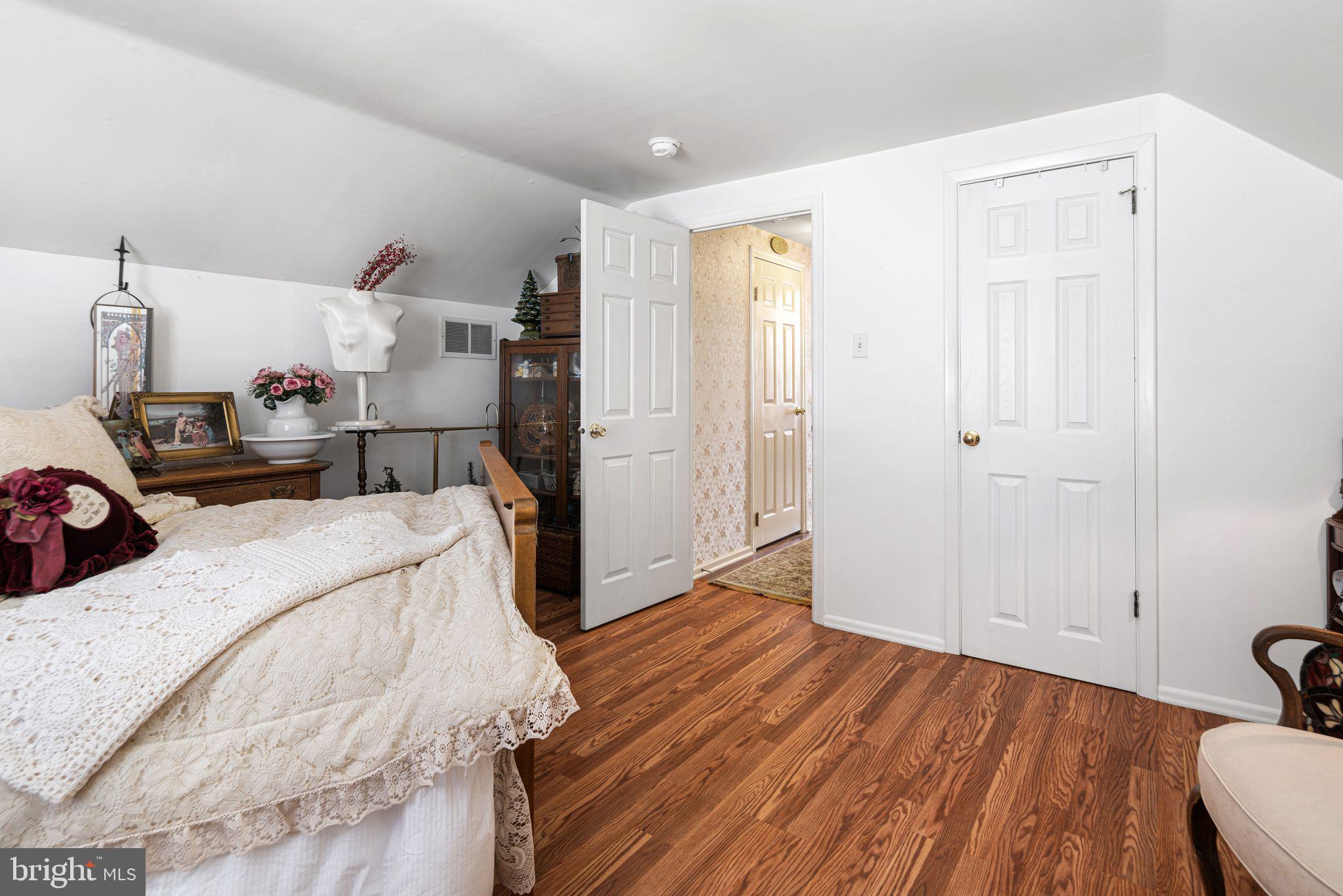 91 Estates Road Pine Hill, NJ 08021 - Photo 21 of 34 a bed room with a bed and a window