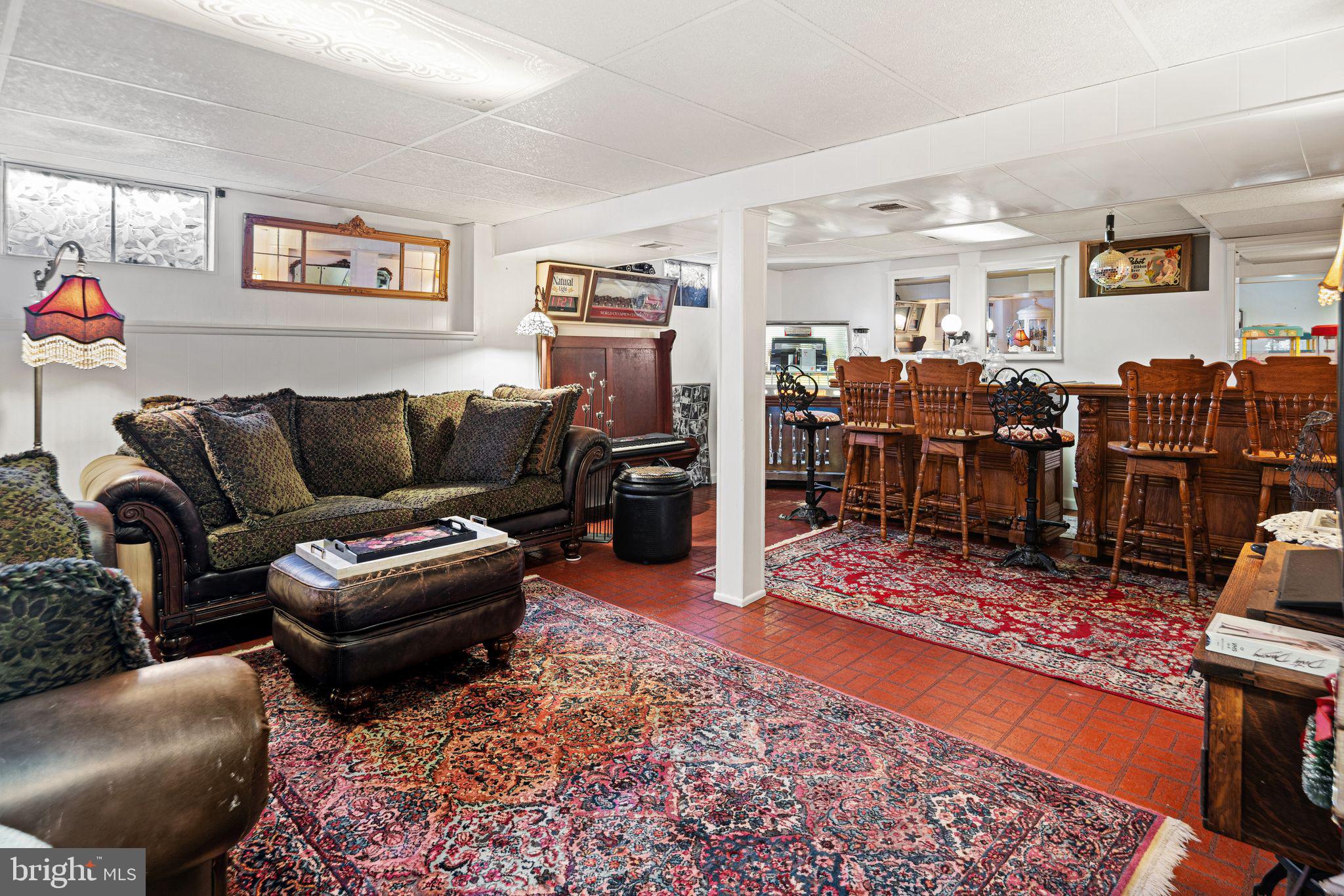 91 Estates Road Pine Hill, NJ 08021 - Photo 26 of 34 a living room with furniture and wooden floor