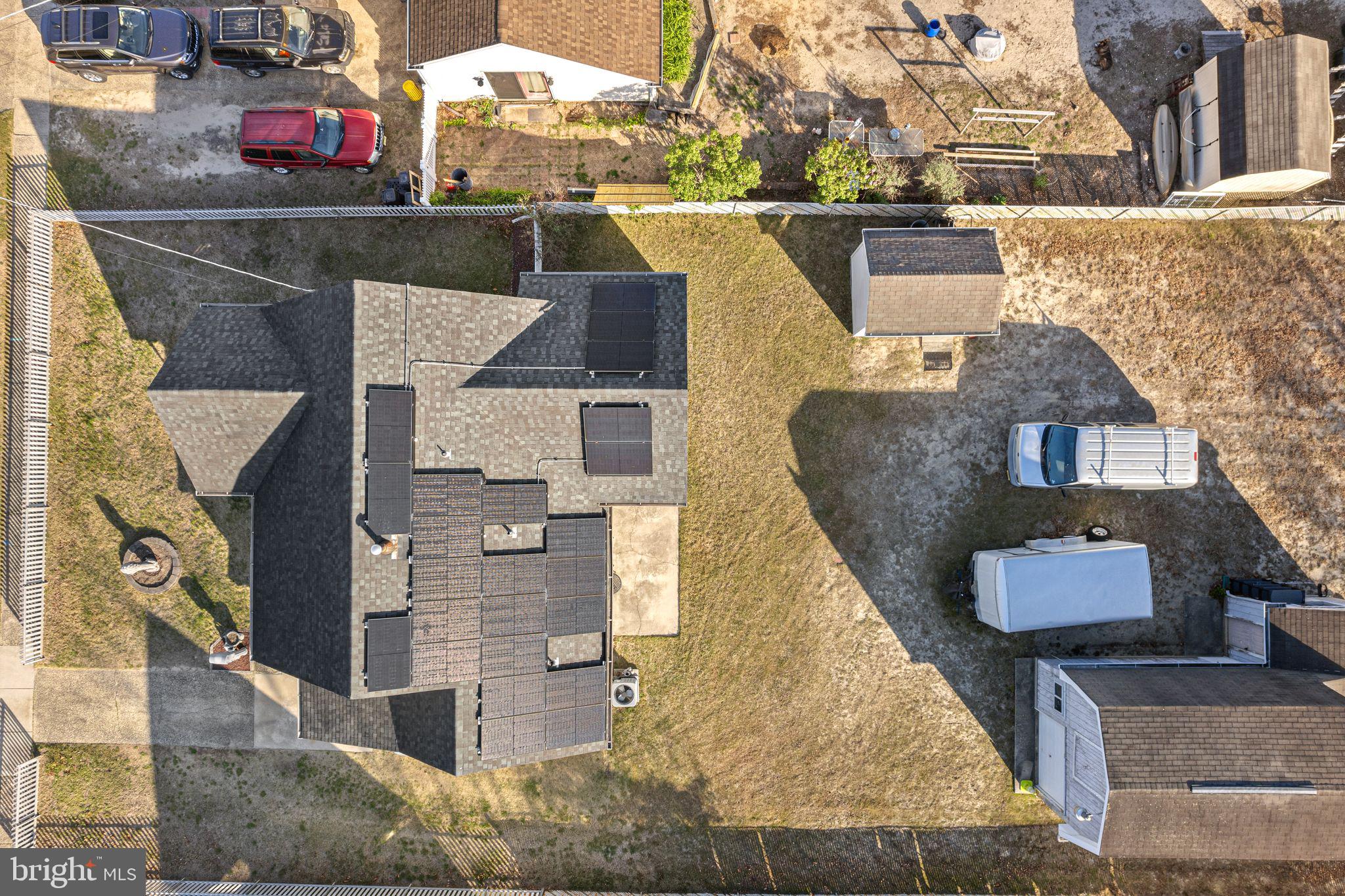91 Estates Road Pine Hill, NJ 08021 - Photo 31 of 34 an aerial view of a house with large trees